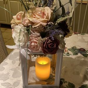 Silk floral centerpieces with candle